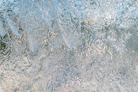 Aqua background. Product space next to clean water streams and water splashes and drops. water...