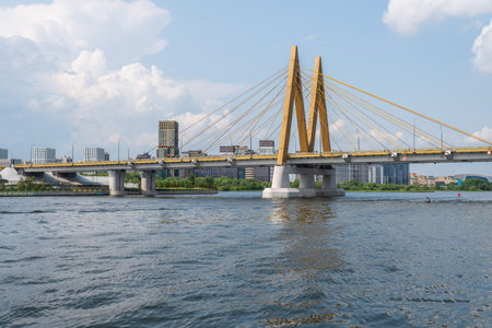 The Millennium Bridge over the Kazanka River on a summer day. The cable-stayed Bridge Millennium in...