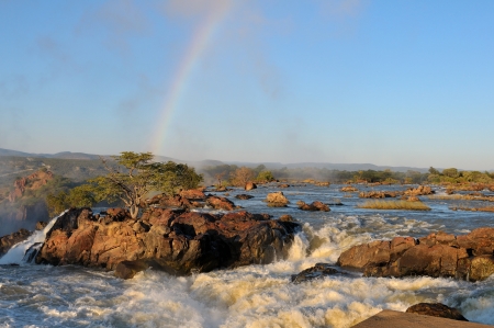 Top of of the Ruacana waterfalls on the border of Namibia and Angola at sunriseの写真素材