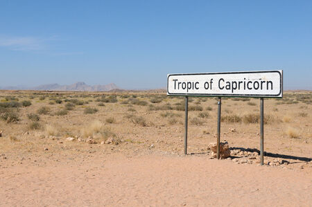 Tropic of Capricorn sign on rhe C14 road in Namibiaの写真素材