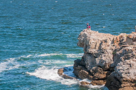 HERMANUS, SOUTH AFRICA - DECEMBER 10, 2014:  Unidentified people enjoying the view at Hermanus. The...