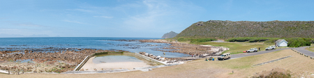 CAPE TOWN, SOUTH AFRICA - DECEMBER 12, 2014:  Beach scene at Bordjiesrif in the Cape Point section of the Table Mountain National Park. Cape Point is in the distanceのeditorial素材