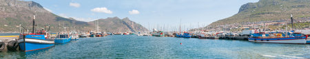CAPE TOWN, SOUTH AFRICA - DECEMBER 12, 2014:  Panorama of Hout Bay harbor and part of the townのeditorial素材