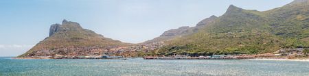 CAPE TOWN, SOUTH AFRICA - DECEMBER 12, 2014:  Panorama of Hout Bay as seen across the bay from the bronze leopard  sculptureのeditorial素材