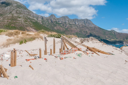 Old police station at Hout Bay reclaimed by sand dunes Cape Town South Africa.の写真素材