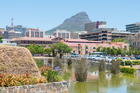 CAPE TOWN, SOUTH AFRICA - DECEMBER 18, 2014:  Moat of the Castle of Good Hope with the central business district and Lions Head in the backのeditorial素材