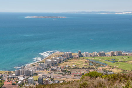 CAPE TOWN SOUTH AFRICA  DECEMBER 18 2014: Sea Point and Robben Island as seen from Signal Hill in Cape Townのeditorial素材