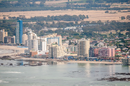 CAPE TOWN, SOUTH AFRICA - DECEMBER 20, 2014: The Strand  and Somerset West as seen across the sea from the viewpoint at the Steenbras Dam pump stationのeditorial素材