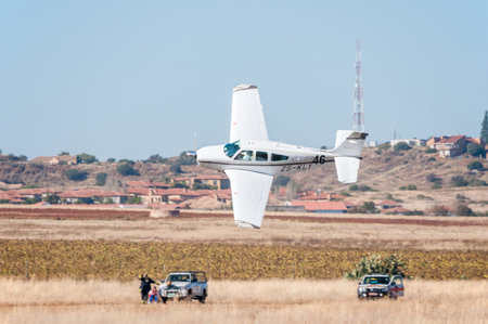 BLOEMFONTEIN SOUTH AFRICA  MAY 29 2015: Beechcraft F33A takes off. The Presidents Trophy Air Race was held at the Tempe Airport from 28 to 30 May 2015. More than 100 light aircraft participatedのeditorial素材