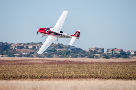 BLOEMFONTEIN SOUTH AFRICA  MAY 29 2015: Cirrus SR22 taking off. The 2015 Presidents Trophy Air Race...