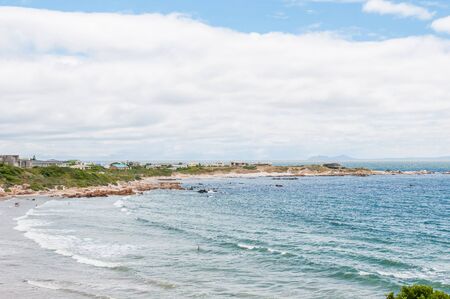 ROOI ELS SOUTH AFRICA  DECEMBER 23 2014: Unidentified people at a beach in Rooi Els near Gordons Bayのeditorial素材
