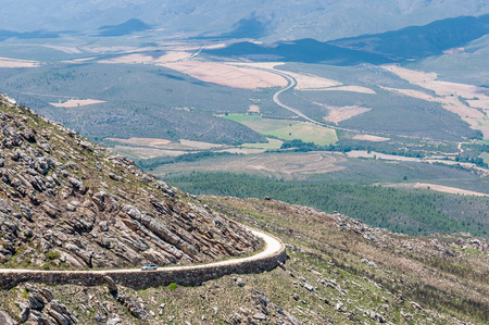 SWARTBERG PASS SOUTH AFRICA  JANUARY 2 2015: View from the Swartberg Pass to the East showing farms down in the valley. The pass is a declared national monument.のeditorial素材
