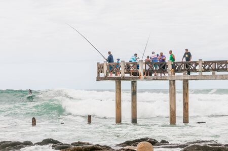GEORGE SOUTH AFRICA  JANUARY 3 2015: Unidentified people on the Bramwell Butler Pier at Victoria Bayのeditorial素材