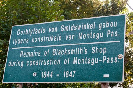MONTAGU PASS SOUTH AFRICA  JANUARY 2 2015: Sign at the site of the historic blacksmith shop in the Montagu Passのeditorial素材