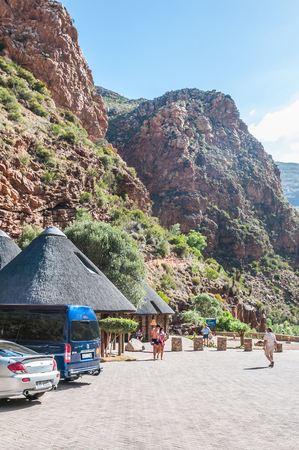 MEIRINGSPOORT SOUTH AFRICA  JANUARY 2 2015: The trail to the waterfall is visible above the parking and picnic areaのeditorial素材