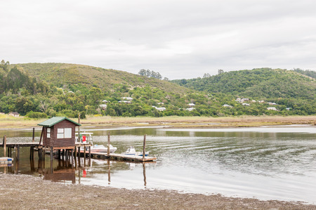 KNYSNA SOUTH AFRICA  JANUARY 5 2015: A pier in the NorthWestern end of the Knysna Lagoon a large warmwater estuaryのeditorial素材