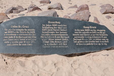 CAPE CROSS, NAMIBIA - JUNE 7, 2011: A memorial stone for Diogo Cao who landed at this spot in 1485 and who erected a stone cross or padrao at this spotのeditorial素材