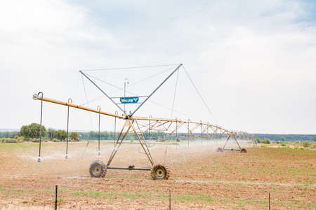 DOUGLAS, SOUTH AFRICA - AUGUST 25, 2015: A center pivot irrigation system using rotator style pivot applicator sprinklers near Douglas in the Northern Cape Provinceのeditorial素材