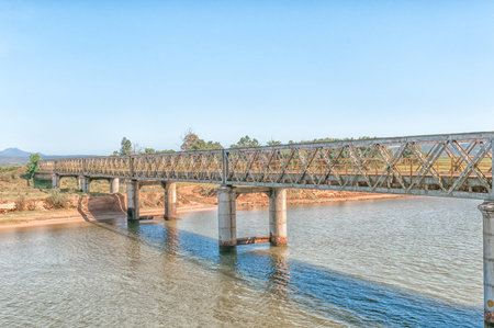 The old bridge over the Gamtoos River between Port Elizabeth and Jeffreys Bay in the Eastern Cape Province of South Africaの写真素材