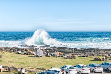 STORMS RIVER MOUTH, SOUTH AFRICA - FEBRUARY 28, 2016:  A huge wave breaking at the day visitor picnic site at Storms River Mouthのeditorial素材