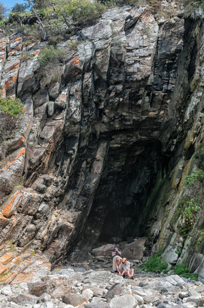 STORMS RIVER MOUTH, SOUTH AFRICA - MARCH 1, 2016:  Unidentified hikers at Guano Cave on the Waterfall trail which also is part of the renowned Otter trailのeditorial素材