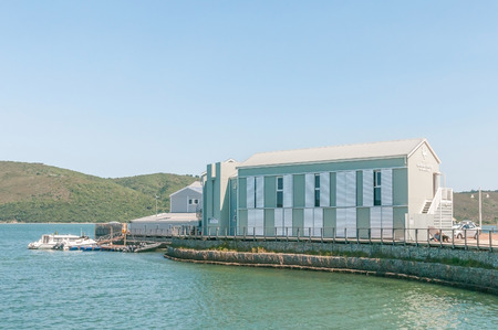 KNYSNA, SOUTH AFRICA - MARCH 3, 2016: The Regional Office of the South African National Parks Board is situated at the historic Thesens Island Jettyのeditorial素材