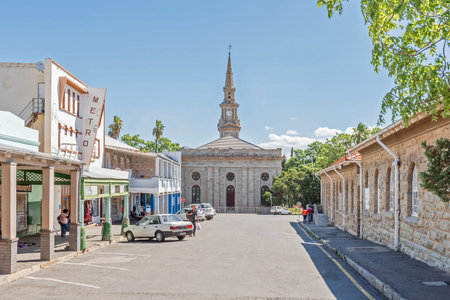 CRADOCK, SOUTH AFRICA - FEBRUARY 16, 2016: A street scene with businesses and the Dutch Reformed Church, built in 1868. Cradock is a medium sized town in the Eastern Cape Provinceのeditorial素材