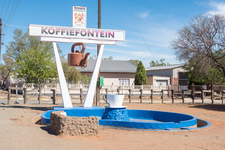 KOFFIEFONTEIN, SOUTH AFRICA - DECEMBER 24, 2016: A coffee kettle and a cup display in Koffiefontein (coffee fountain), a diamond mining town in the Free State Provinceのeditorial素材