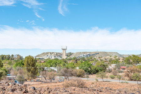 KOFFIEFONTEIN, SOUTH AFRICA - DECEMBER 24, 2016: A view of Koffiefontein (coffee fountain) towards the mine as seen from the Burgher  Monument. The mine was opened in 1870のeditorial素材