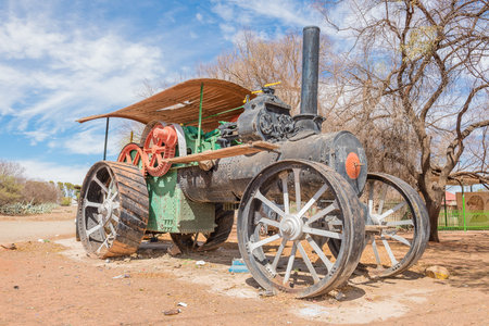KOFFIEFONTEIN, SOUTH AFRICA - DECEMBER 24, 2016: An historic old steam tractor in Koffiefontein, a diamond mining town in the Free State Provinceのeditorial素材