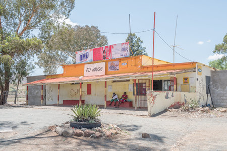 FAURESMITH, SOUTH AFRICA - DECEMBER 31, 2016: Unidentified people in front of a  supermarket in Fauresmith, a small town in the Free State Provinceのeditorial素材
