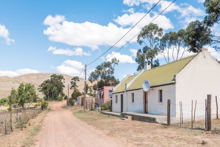 GENADENDAL, SOUTH AFRICA - MARCH 27, 2017: Houses next to a road near Genadendal, the first mission station in South Africa, founded 1738のeditorial素材