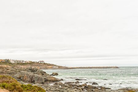YZERFONTEIN, SOUTH AFRICA - MARCH 31, 2017: A view of houses and the harbor at Yzerfontein on the West Coast of the Western Cape Provinceのeditorial素材