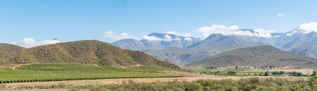 Panorama of a farm landscape with the Swartberg (black mountain) in the back near Hoeko in the Western Cape Provinceの写真素材