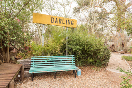 DARLING, SOUTH AFRICA - MARCH 31, 2017: A bench and name sign at Evita se Perron in Darling, a town in the Western Cape Provinceのeditorial素材