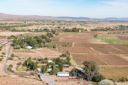KEIMOES, SOUTH AFRICA - JUNE 12, 2017: A farm landscape with vineyards as seen from the viewpoint on Tierberg (Tiger Mountain) at Keimoesのeditorial素材