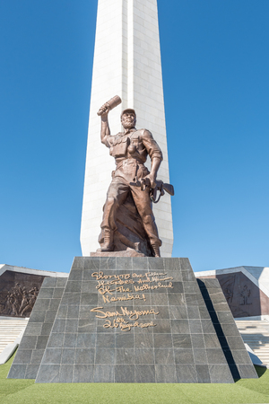 WINDHOEK, NAMIBIA - JUNE 16, 2017: An 8 meter high bronze sculpture of The Unknown Soldier at Heroes Acre, an official war memorial of the Republic of Namibia to the south of Windhoekのeditorial素材