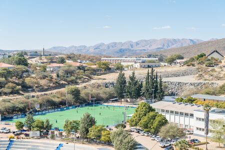 WINDHOEK, NAMIBIA - JUNE 17, 2017: Aerial view of the astroturf hockey field of Windhoek High School, founded in 1917, in Windhoek, the capital city of Namibiaのeditorial素材