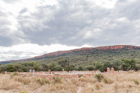 WATERBERG PLATEAU NATIONAL PARK, NAMIBIA - JUNE 19, 2017: The German military graveyard from the battle in 1904 between German and Herero armiesのeditorial素材