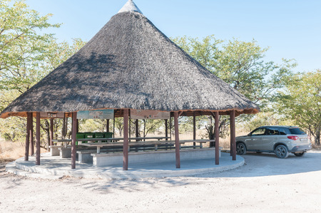 ETOSHA NATIONAL PARK, NAMIBIA - JUNE 21, 2017: A thatched picnic spot on the C38-road between Namutoni and Halali in the Etosha National Park, Namibiaのeditorial素材