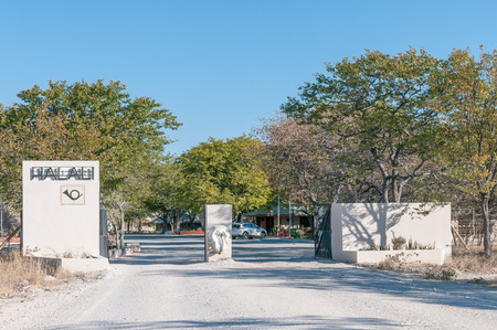 ETOSHA NATIONAL PARK, NAMIBIA - JUNE 21, 2017: The entrance to Halali Rest Camp in the Etosha National Park, Namibia. The name Halali was derived from the sound of a hunting hornのeditorial素材