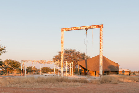 ETOSHA NATIONAL PARK, NAMIBIA - JUNE 26, 2017: Structures of an old elephant abattoir at the Olifantsrus Rest Camp in the Etosha National Park at sunriseのeditorial素材