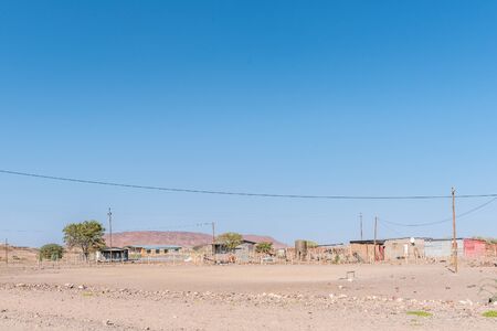 BERGSIG, NAMIBIA - JUNE 28, 2017: A street scene with houses in Bergsig, a small village in the Kunene Region of Namibiaのeditorial素材