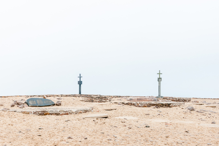 CAPE CROSS, NAMIBIA - JUNE 29, 2017: The two crosses and memorial stones at the Cape Cross seal colony on the Skeleton Coast of Namibiaのeditorial素材