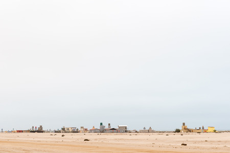 WLOTZKASBAKEN, NAMIBIA - JUNE 29, 2017: A view of Wlotzkasbaken, a small holiday village in the Namib Desert between Henties Bay and Swakopmund on the Skeleton Coast of Namibiaのeditorial素材
