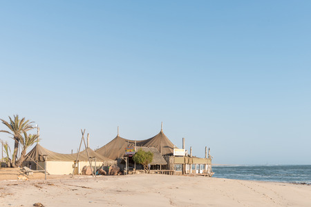 SWAKOPMUND, NAMIBIA - JUNE 30, 2017: Entrance of the Tiger Reef restaurant and bar in Swakopmund in the Namib Desert on the Atlantic Coast of Namibiaのeditorial素材