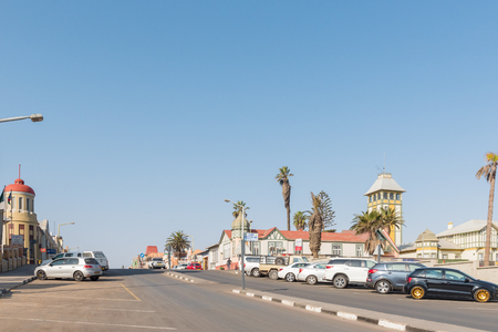 SWAKOPMUND, NAMIBIA - JUNE 30, 2017: A street scene, with historic buildings and vehicles, in Swakopmund in the Namib Desert on the Atlantic Coast of Namibiaのeditorial素材