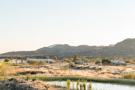 GROSS BARMEN, NAMIBIA - JULY 3, 2017: Sunset view of the camping site in Gross Barmen, near Okahandja in the Otjozondjupa Region of Namibiaのeditorial素材
