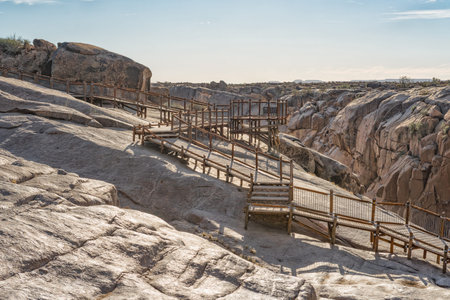 A viewpoint and boardwalk at the top of the Augrabies main waterfallの写真素材