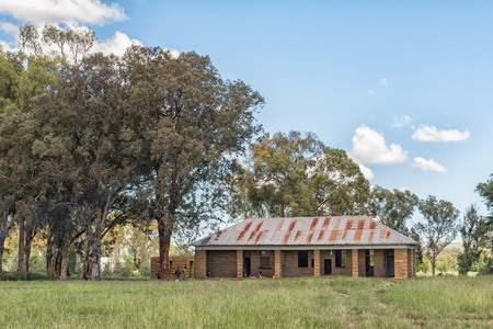 FICKSBURG, SOUTH AFRICA - MARCH 12, 2018: The ruin of the Gumtree railway station building near Ficksburg in the Free State Provinceのeditorial素材